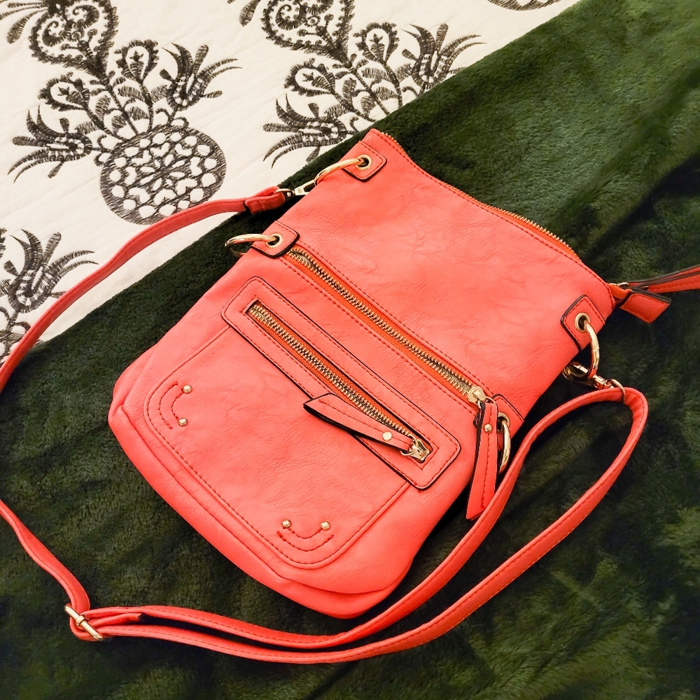 Neon pink cross-body bag